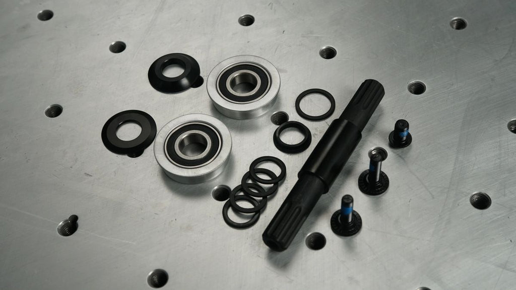 Bottom bracket with spindle — CNC billet aluminum bottom bracket for custom builds